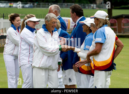 Players and umpires shaking hands before the triples final at the national women`s lawn bowls championships, Leamington Spa, UK Stock Photo